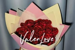 ดอกกุหลาบริบบิ้น 7ดอก ห่อแบบแหลม by Valen.Love